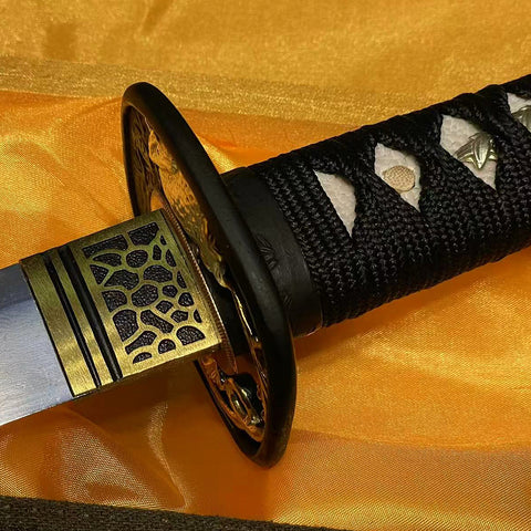 Detailed view of Wakizashi handle with genuine rayskin and traditional silk-wrapped ito for secure grip.SL-327-U

