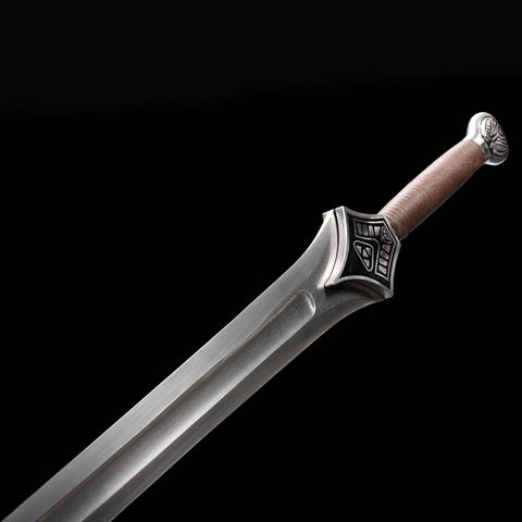 Detailed close-up showing the intricate Damascus steel pattern on the Conan Mother’s Sword blade, highlighting expert hand-forging craftsmanship.
