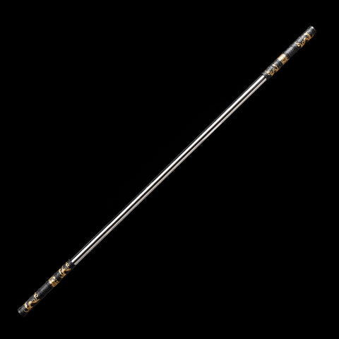 Close-up of dragon-carved black-gold alloy fittings on the Monkey King’s legendary Jingu Bang staff

QQbxjjgb