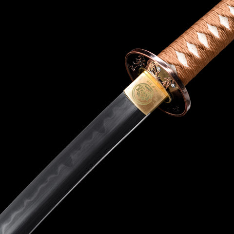 Detailed shot of the Bloodbane handle wrapped in True Ray Skin for enhanced grip and comfort.