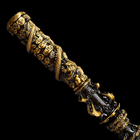 Polished end cap of the Ruyi Jingu Bang with dark red and black alloy textures and detailed engravings
QQhjjgb
