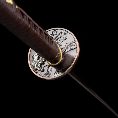 Traditional hand-forging process visible in every detail of the folded steel blade

