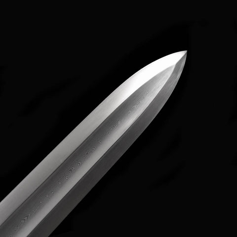 Insight into the hand-forging process used to craft the Damascus steel blade of the Conan Mother’s Sword.