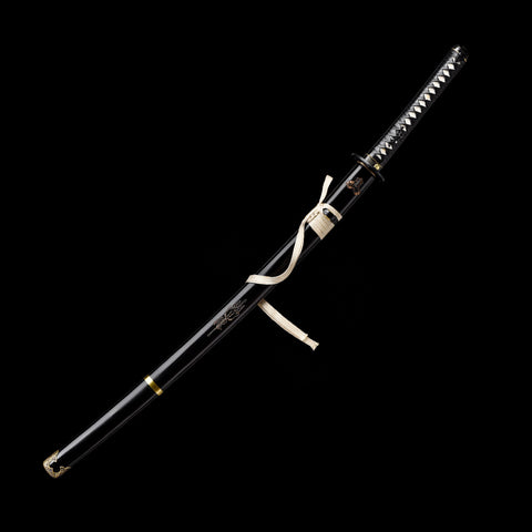 Full view of the battle-ready katana resting on a display stand

