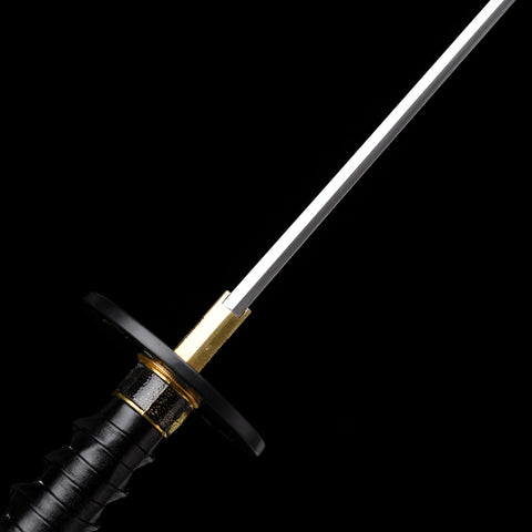 Katana displayed with its saya, revealing the seamless blend of function and beauty

