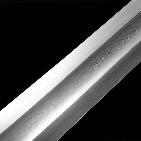 Stunning reflection on the polished Damascus steel blade of the Conan