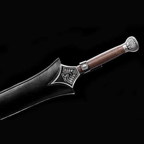 Authentic hardwood handle wrapped with genuine rayskin and iron fittings for a secure grip on the Conan Mother’s Sword.