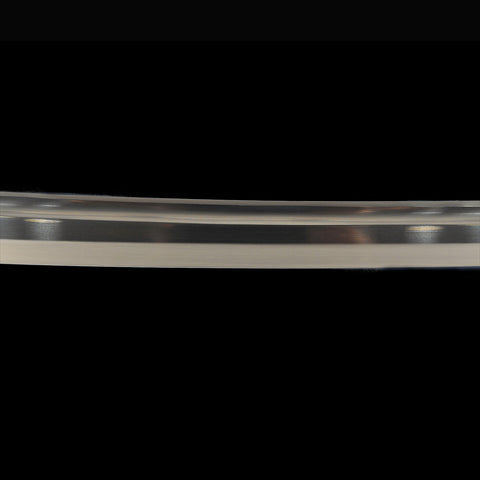 Traditional Japanese swordsmith hand forging 1095 high carbon steel blade.